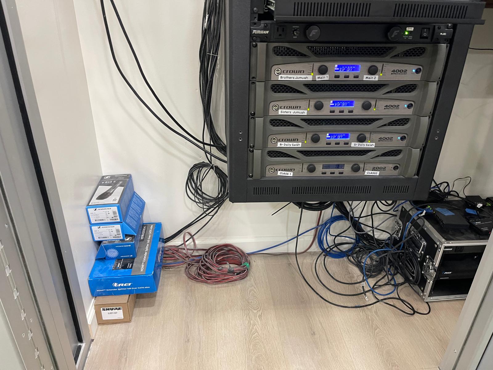 Professional Crown amplifier rack with Sennheiser and Shure equipment — Pixel N Sound Events AV system